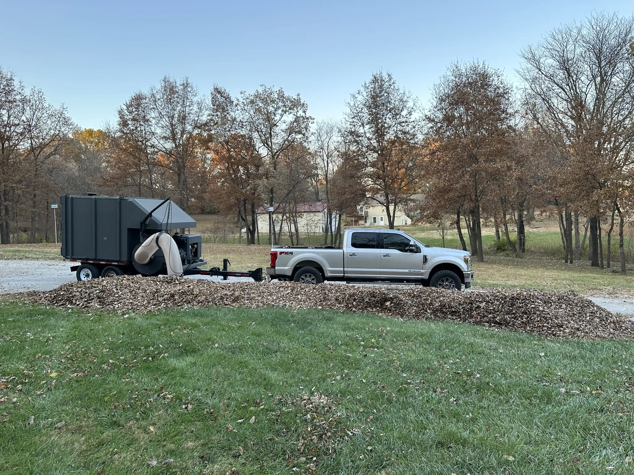 Professional leaf removal in progress