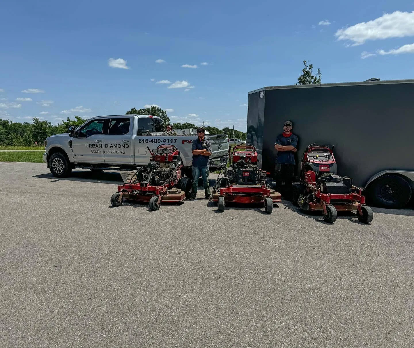 Fleet of professional lawn mowers used by Urban Diamond crews