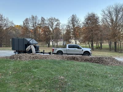 Professional leaf removal in progress